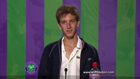 Wimbledon Boys' Singles champion Filip Peliwo talks to the media