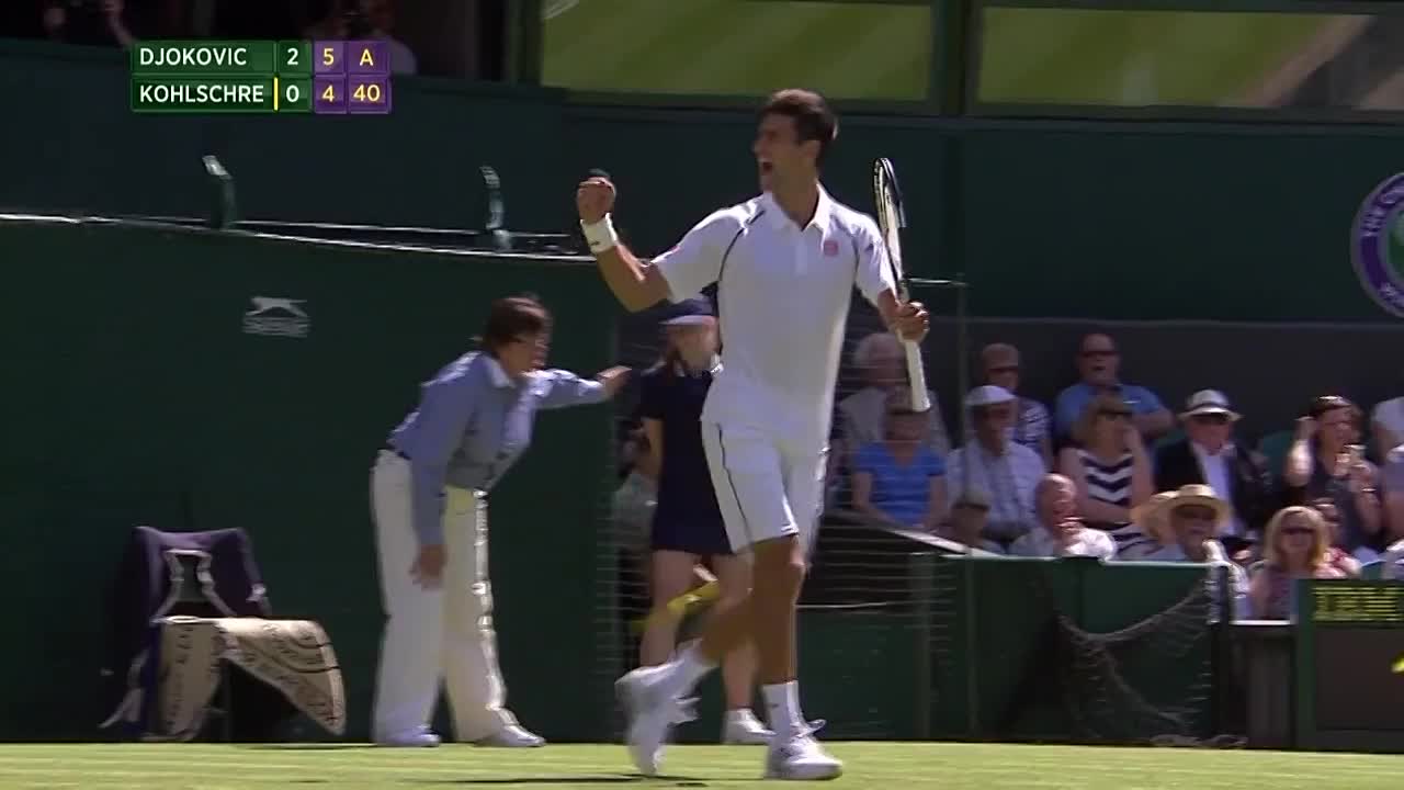 Novak Djokovic kisses the turf