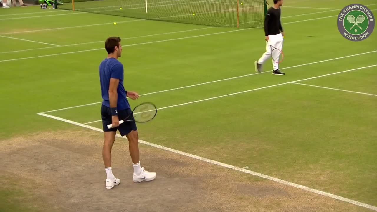 Juan Martin del Potro on practice court before resuming third round battle