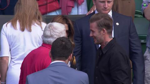 Beckham and the Federers take a moment after Roger's win