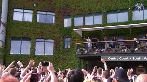 Andy Murray shows off his second Wimbledon trophy